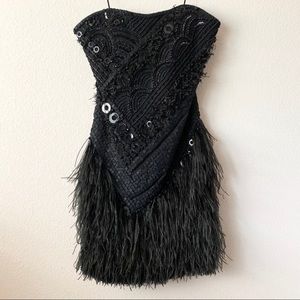 Marchesa strapless beaded feather dress